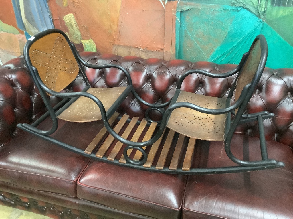 An early 20th century child's bentwood twin seat rocking chair, length 120cm